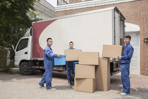 Moving van and packed boxes for removals in Cowley