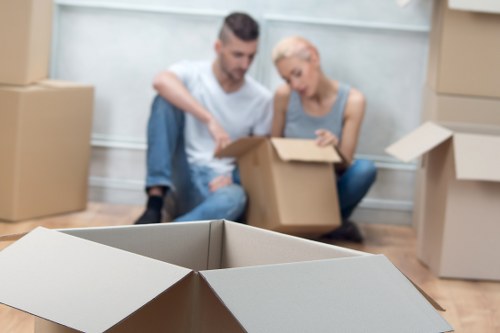 Office boxes and furniture arranged for a smooth business move in Cowley