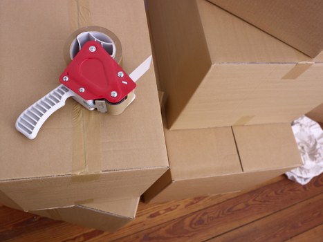 House move preparation with boxes and furniture in Cowley